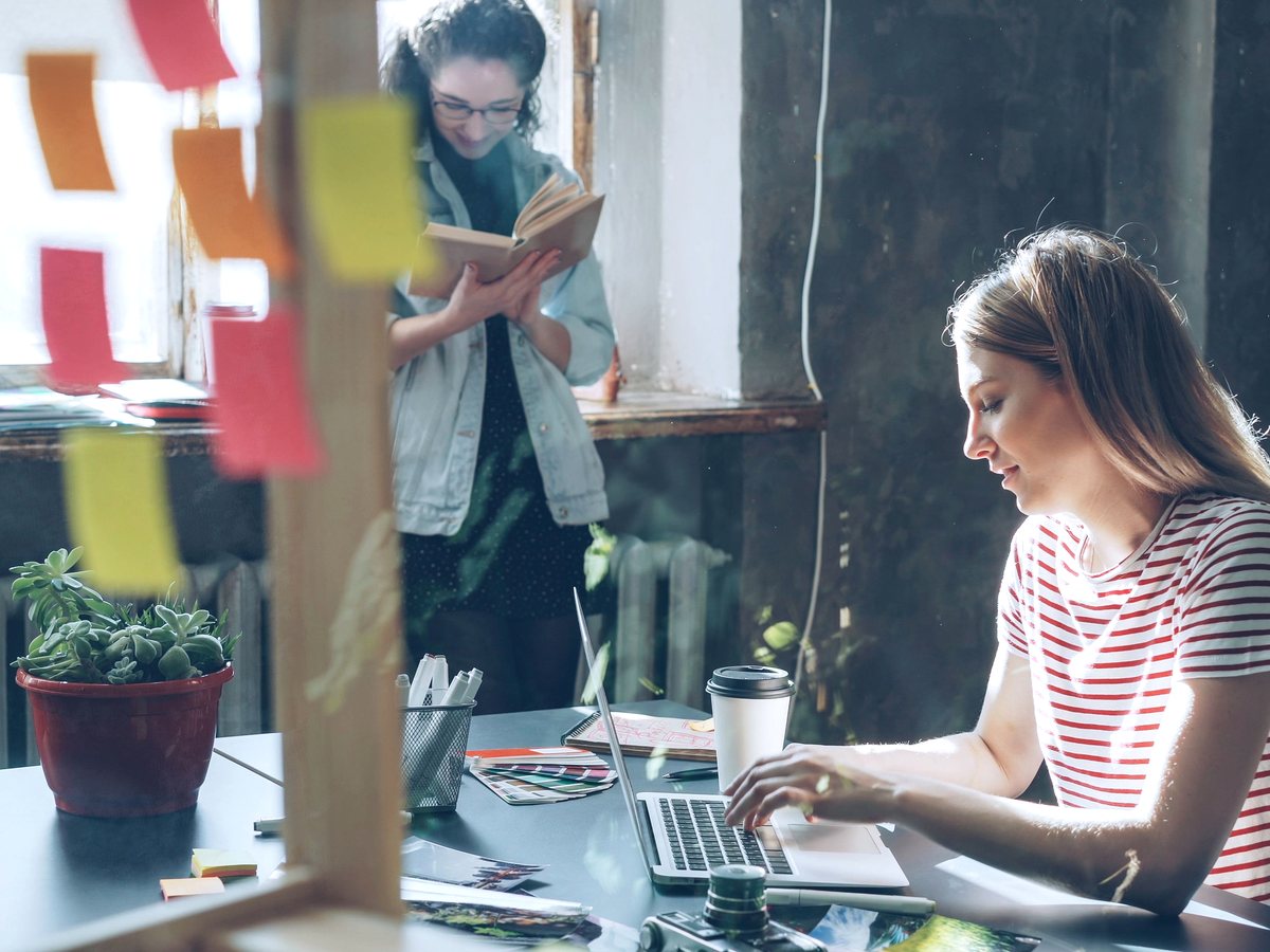 A creative and marketing team collaborating in an office