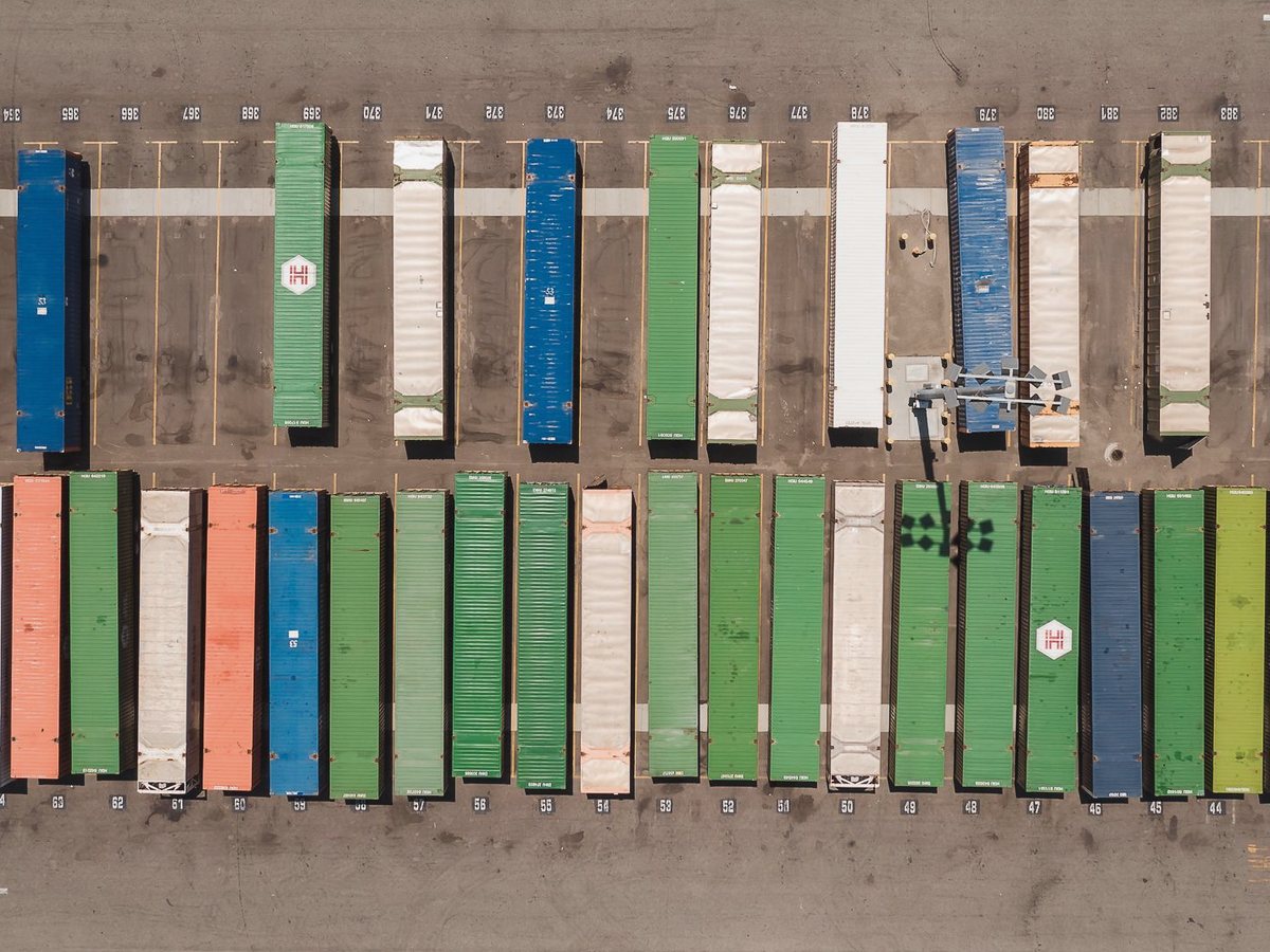 Aerial view of shipping containers at a port terminal
