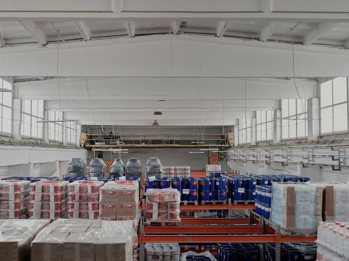 A large warehouse with goods on racks